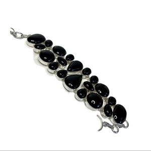 Polished Black Onyx set in silver, cuff bracelet.